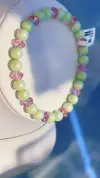 A light green beaded bracelet decorated with pink rainbow-cut crystal glass titanium steel men's crystal bracelet details Picture
